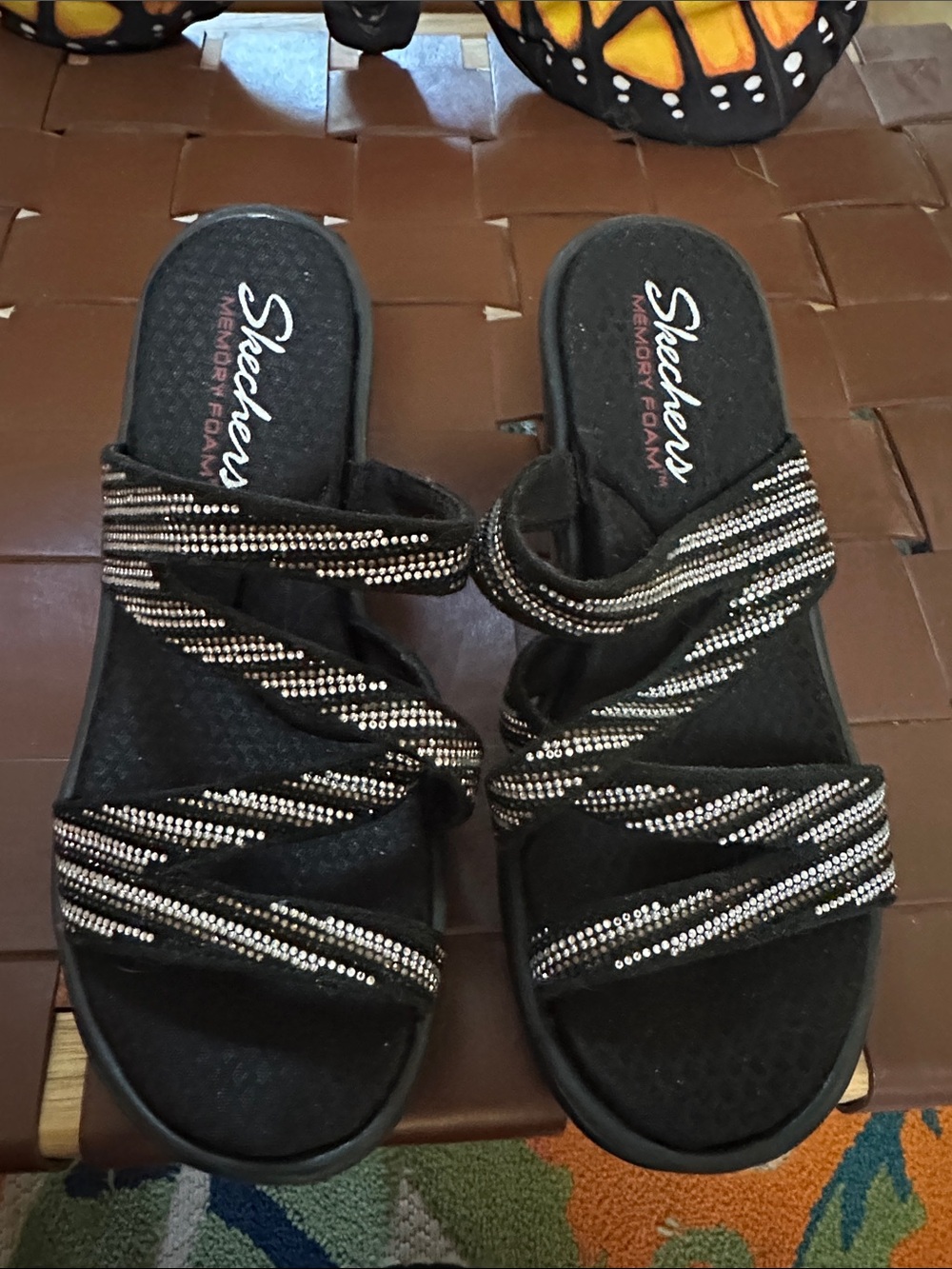 Skechers Black Slip-On Sandals with Silver Embellishments